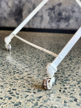 Load image into Gallery viewer, Vintage metal baby crib on wheels