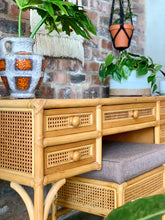 Load image into Gallery viewer, Vintage cane dresser/desk & stool