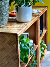 Load image into Gallery viewer, A Pair of Vintage Campaign Style Cane Bookshelves
