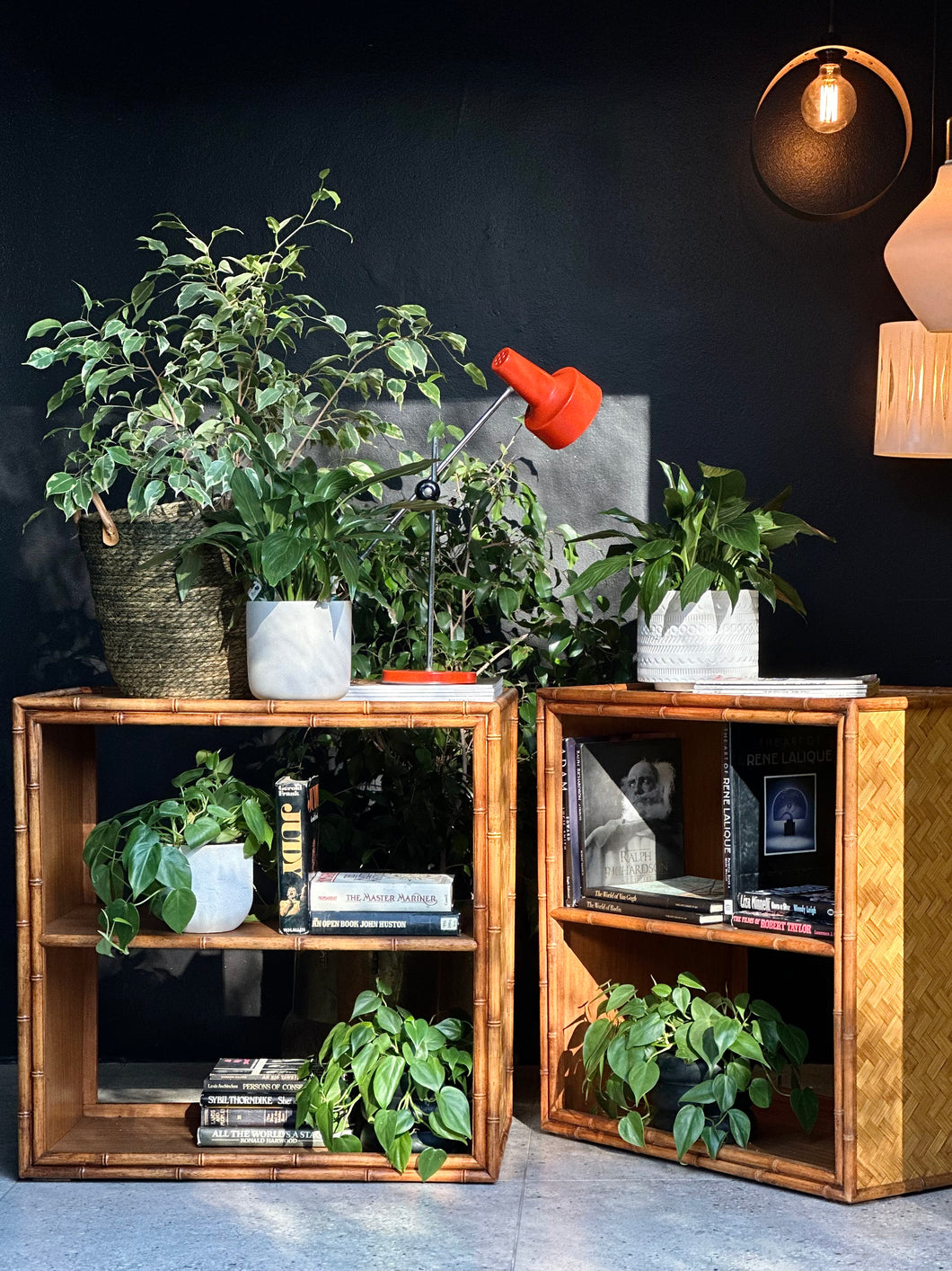 A Pair of Vintage Campaign Style Cane Bookshelves