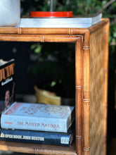 Load image into Gallery viewer, A Pair of Vintage Campaign Style Cane Bookshelves
