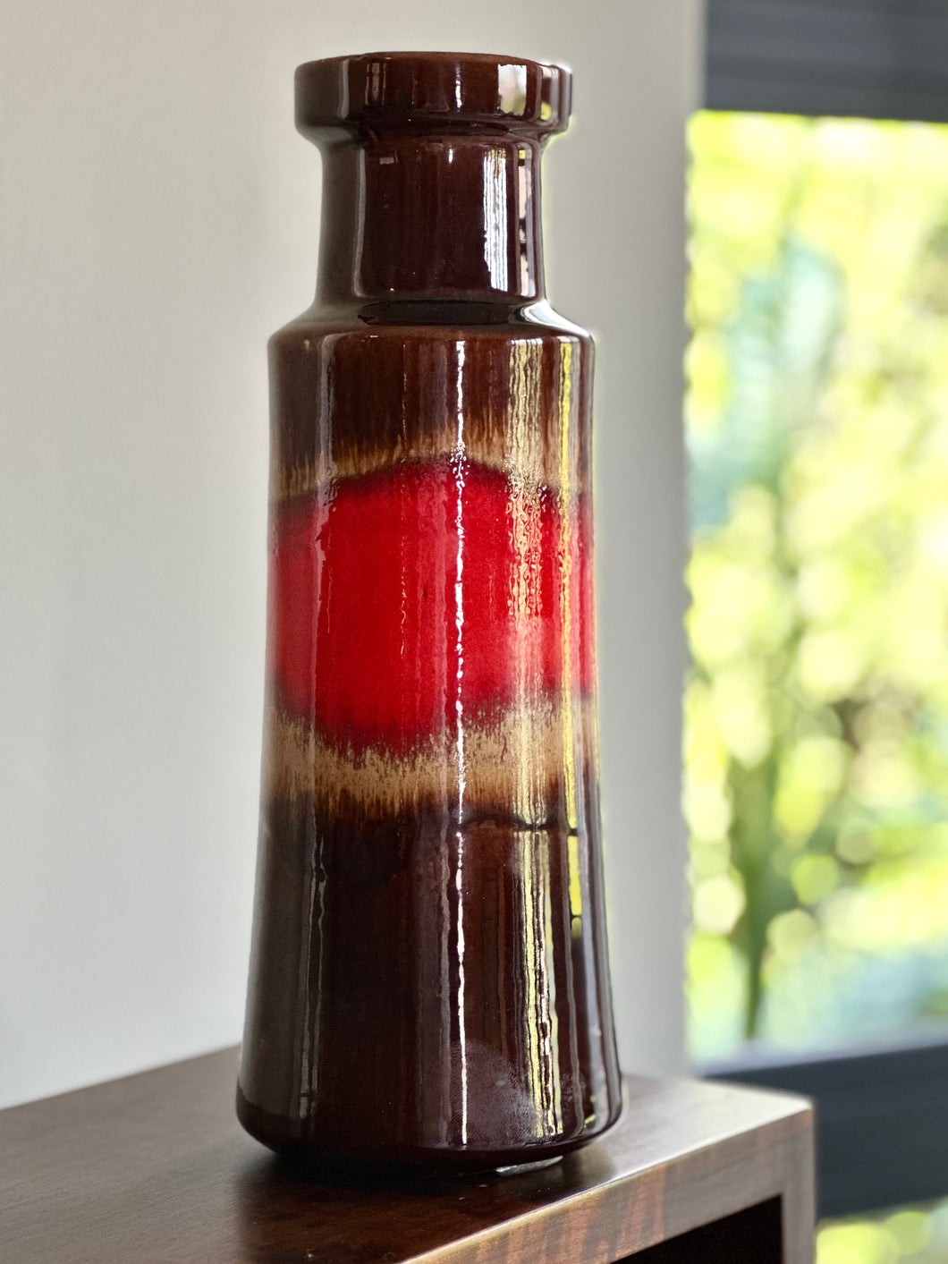 A cylindrical pottery vase by Scheurich of West Germany