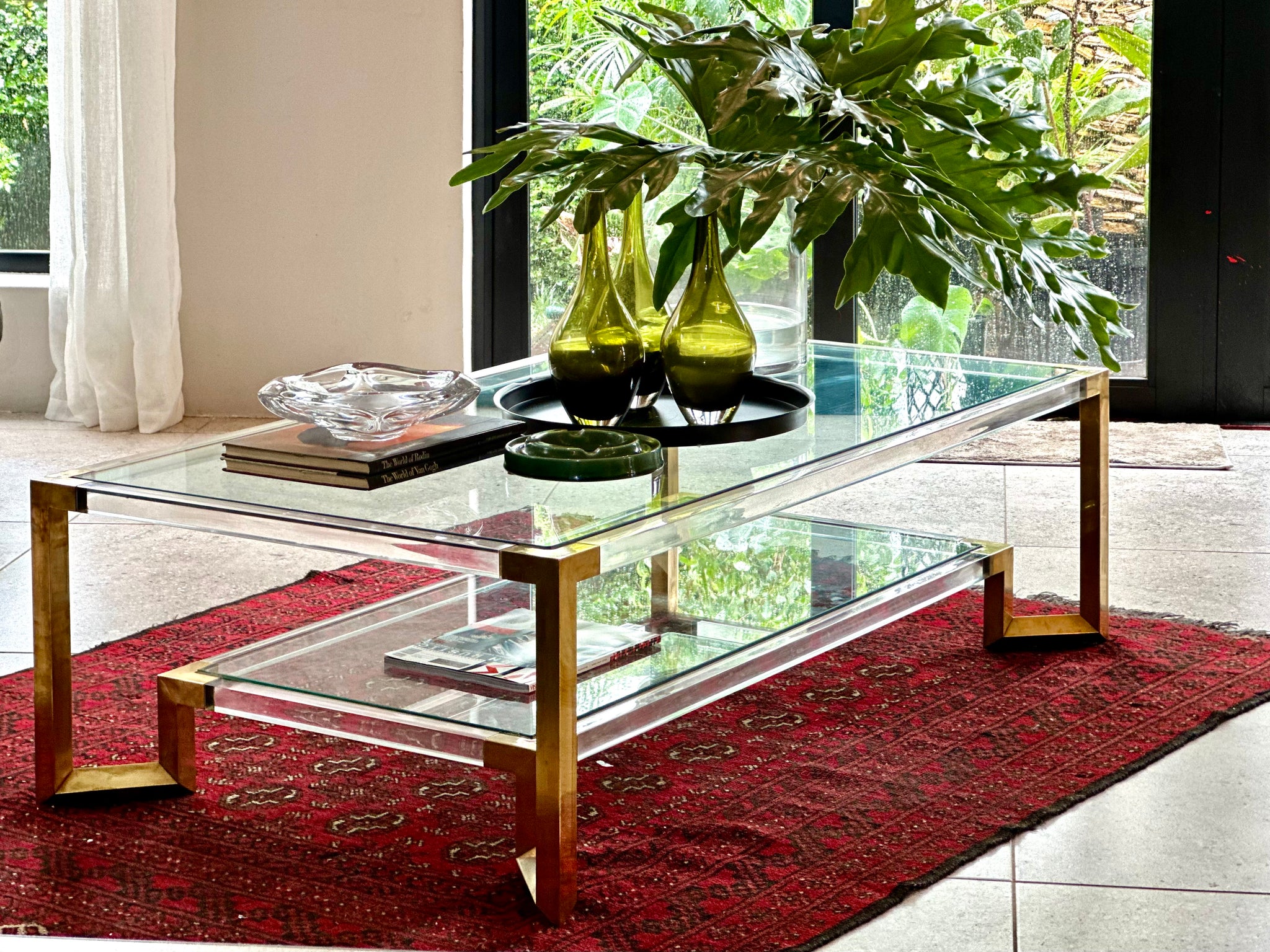 Contemporary brass and glass coffee table