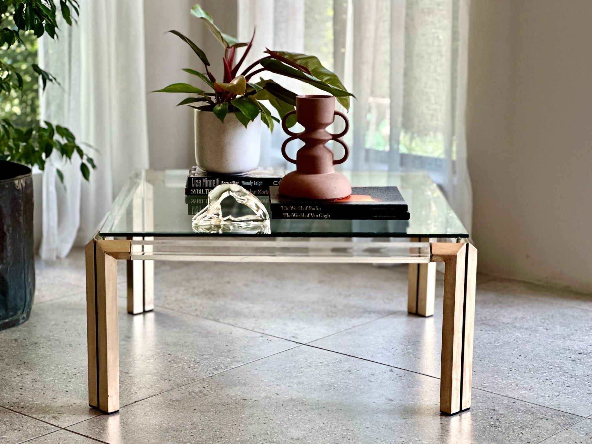 Contemporary brass and glass coffee table