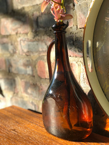 Dark amber glass jug