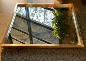 Brass framed mirror