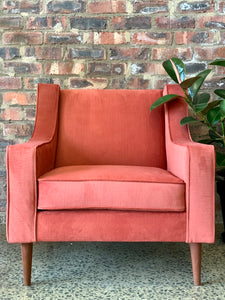 Fully upholstered mid-century armchair