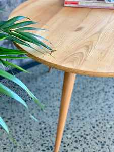 Low round wooden coffee table