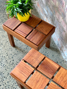 A pair of cubist side tables