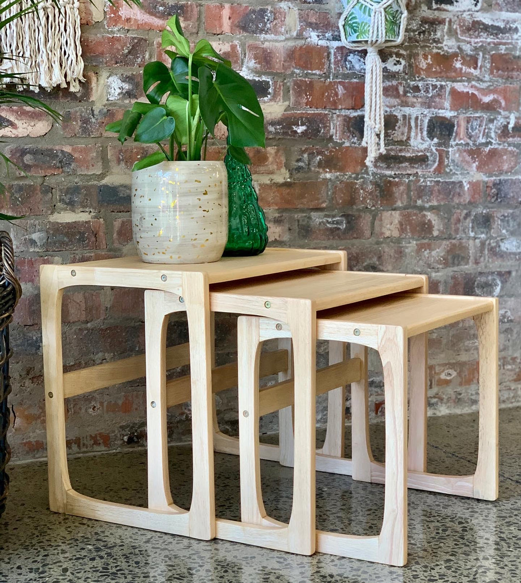 Nest of three side tables in beech wood