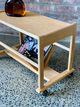 Load image into Gallery viewer, Oak Magazine table on wheels
